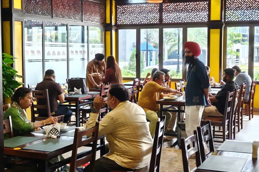 Flying Flyer guests enjoying authentic Indian cuisine at The One Indian Halong Restaurant in Halong Bay